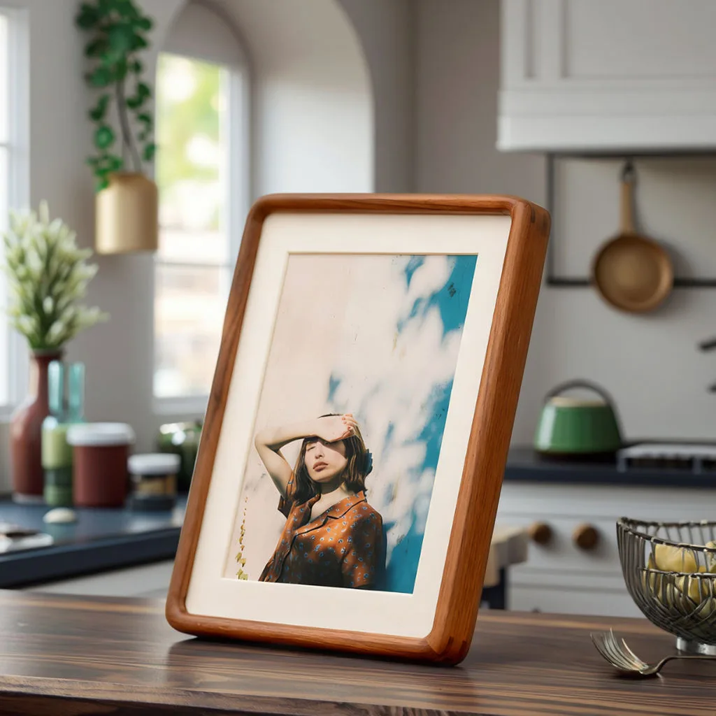 Rounded wooden photo frame displayed on a tabletop